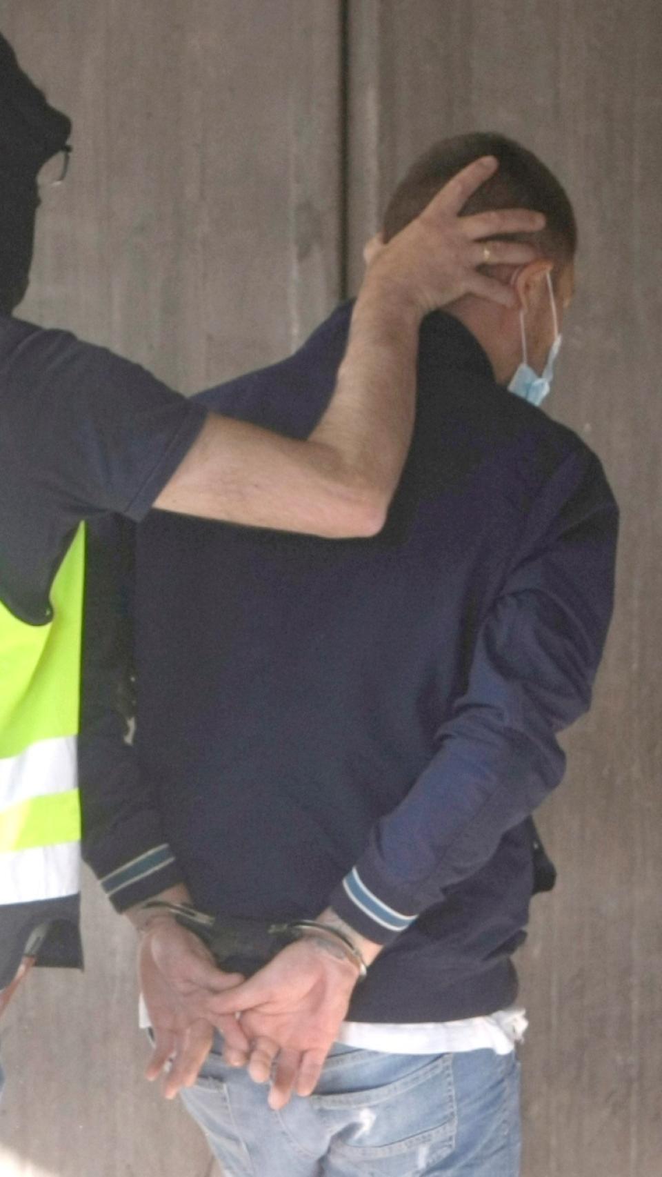 Uno de los detenidos por el crimen de Samuel, al pasar este viernes a disposición judicial.