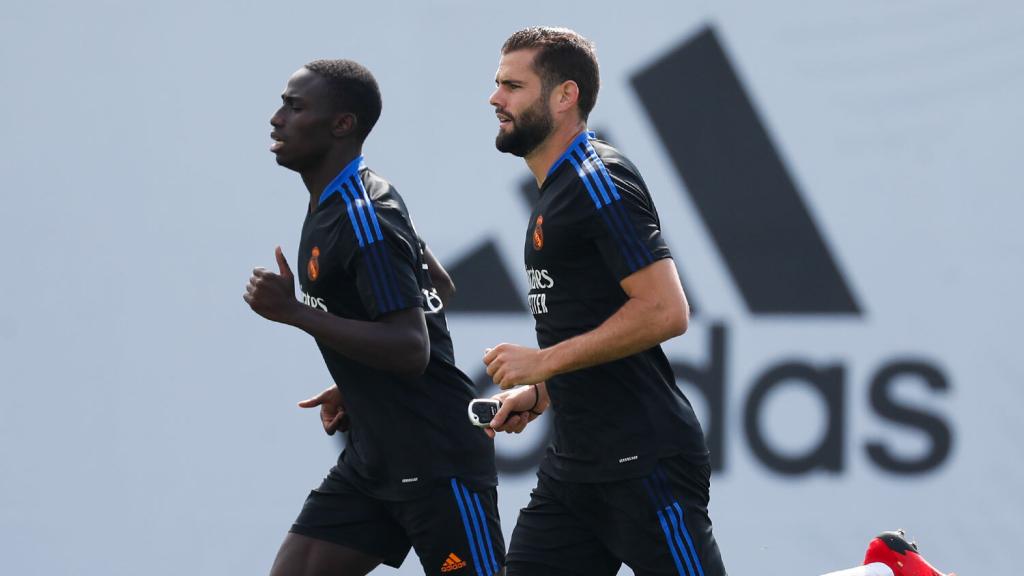 Ferland Mendy y Nacho Fernández corriendo en la ciudad deportiva