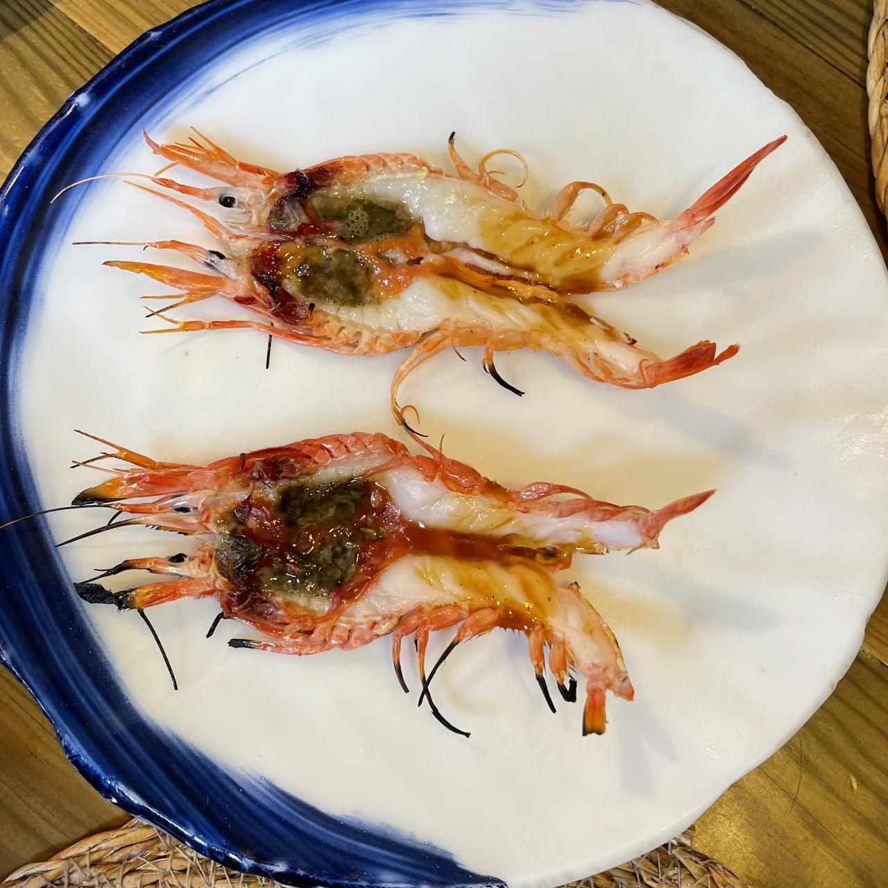 Gamba de Roses y jugo de pollo