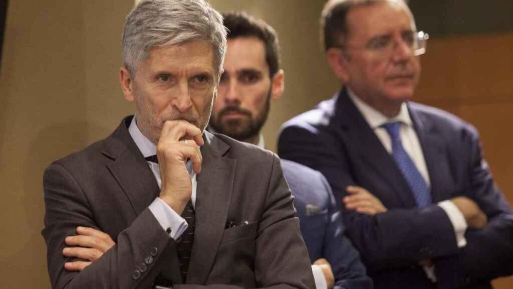 Marlaska, y Ortiz al fondo.