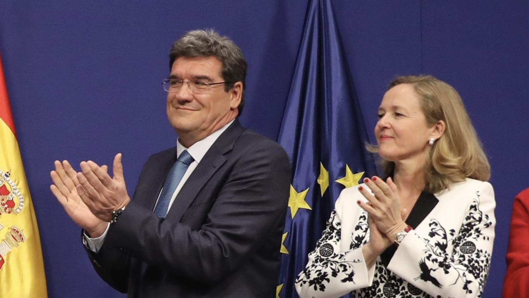 Los ministros José Luis Escrivá y Nadia Calviño.