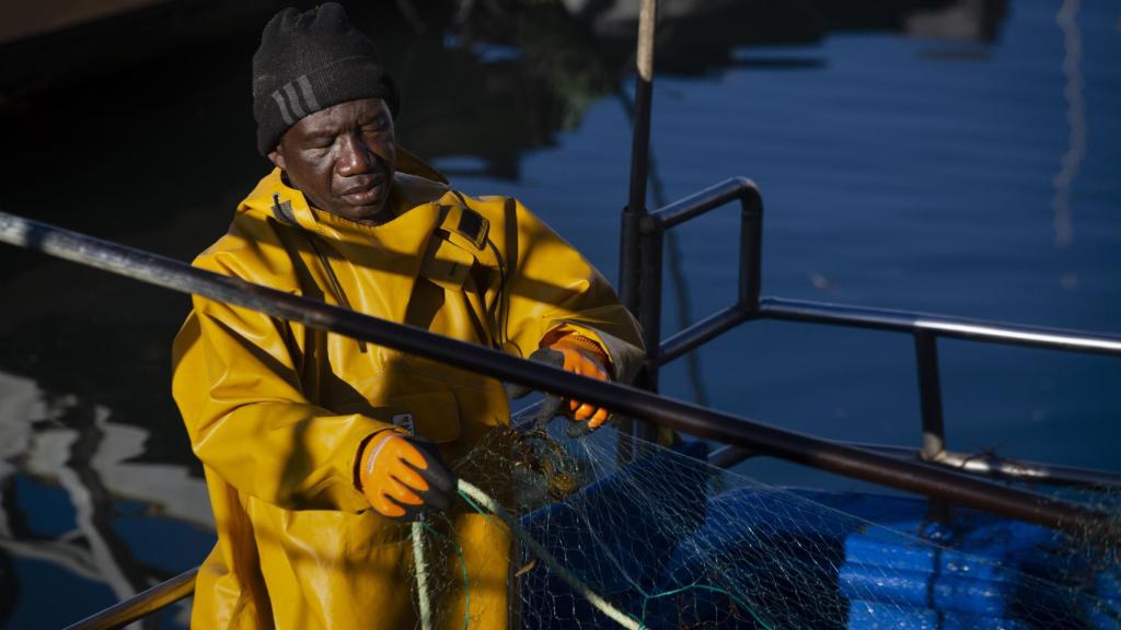 Un marinero en el puerto.