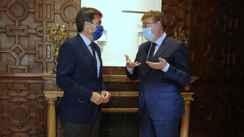 Carlos Mazón y Ximo Puig, durante su encuentro de este lunes. EE
