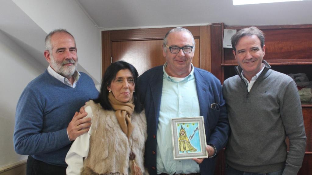 Sara Luque, junto a Garín, Betés y Atencia en la comida del Rey Mago.