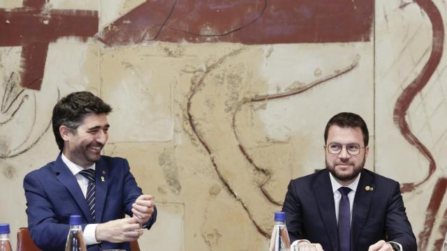 El presidente de la Generalitat, Pere Aragonés, junto a su vicepresidente, Jordi Puigneró.