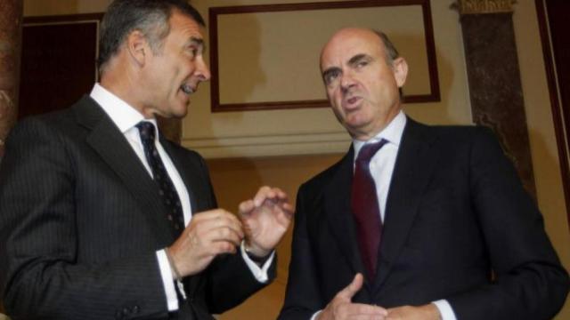 Borja García-Nieto junto a Luis de Guindos, exministro de Economía