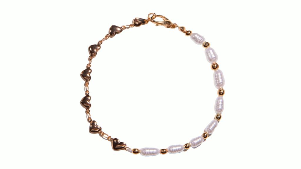 Collar de piedras blancas y dorado de JOYS.