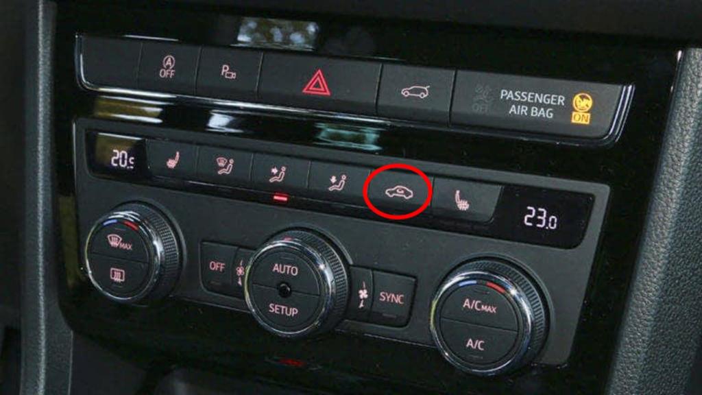 Botón de recirculación del aire.