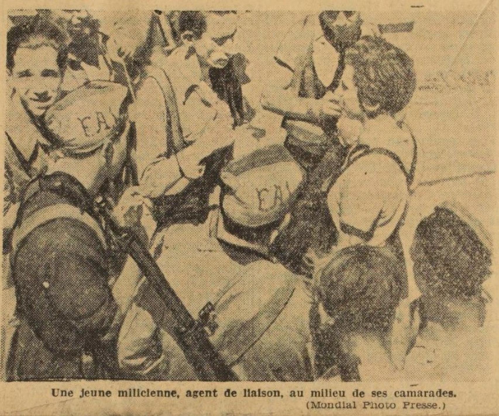 Gerda Taro con mono oscuro y camisa blanca de manga corta. Fotografía de Mondial Photo Presse aparecida en el diario francés La Dépêche en su número del 20 de septiembre de 1936.