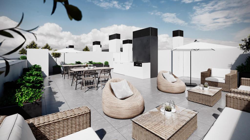 Zona de ocio con barbacoa diseñado en el nuevo edificio de viviendas.