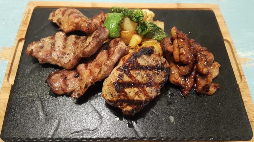 Uno de los platos de carne a la brasa en El Abrasador El Astral