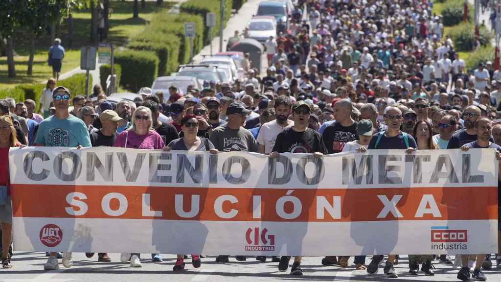 Cabecera de la manifestación celebrada hoy, a su paso por el barrio de Coia.