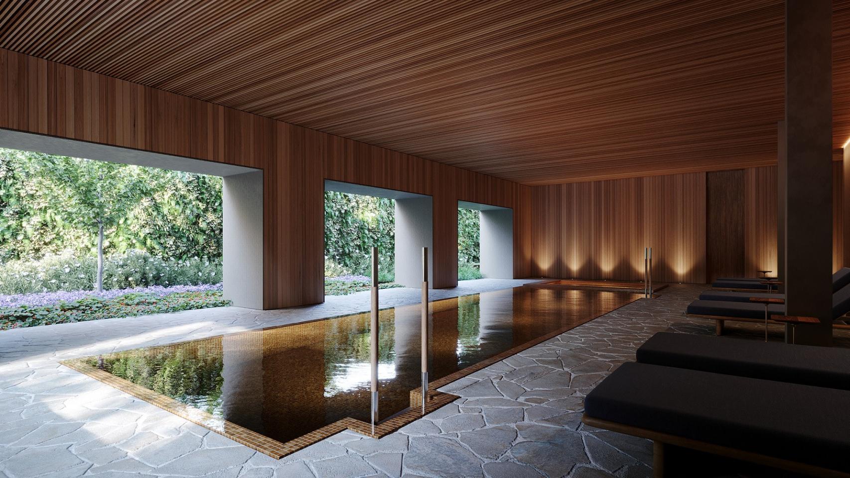 Zona de piscina en el spa interior del edificio.