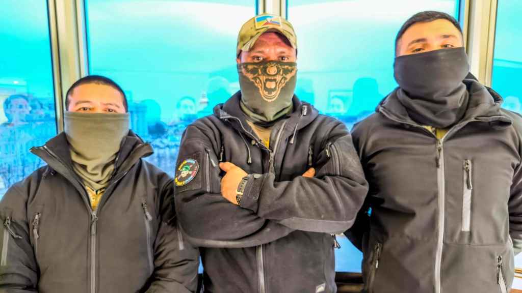 Tres colombianos que combaten del lado de los ucranianos.