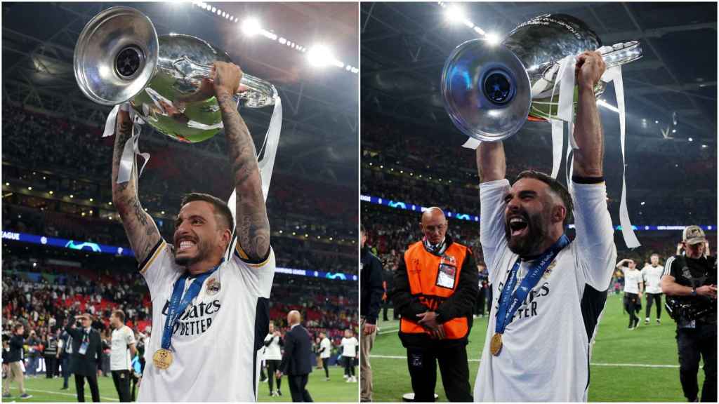 Joselu y Carvajal, durante la celebración de la Champions League en Wembley