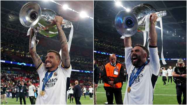 Joselu y Carvajal, durante la celebración de la Champions League en Wembley