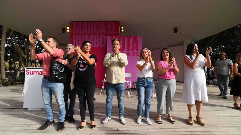 Yolanda Díaz, Toni Valero y Manu Pineda al inicio de un mitin de Sumar en Málaga.