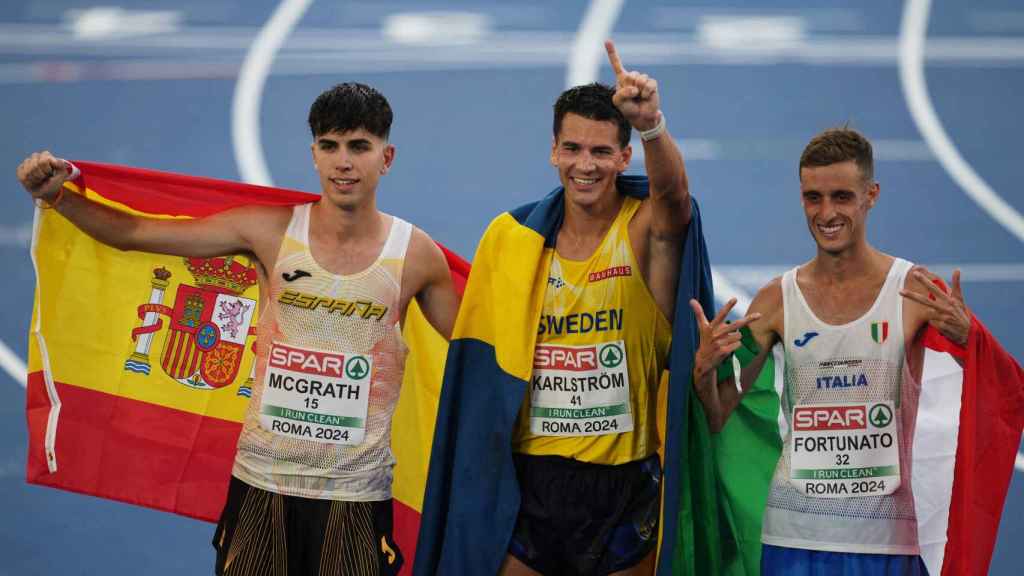 McGrath, junto al resto de componentes del podio.