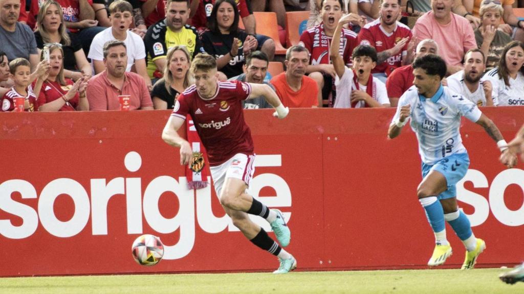 Un lance del encuentro entre el Nástic y el Málaga.