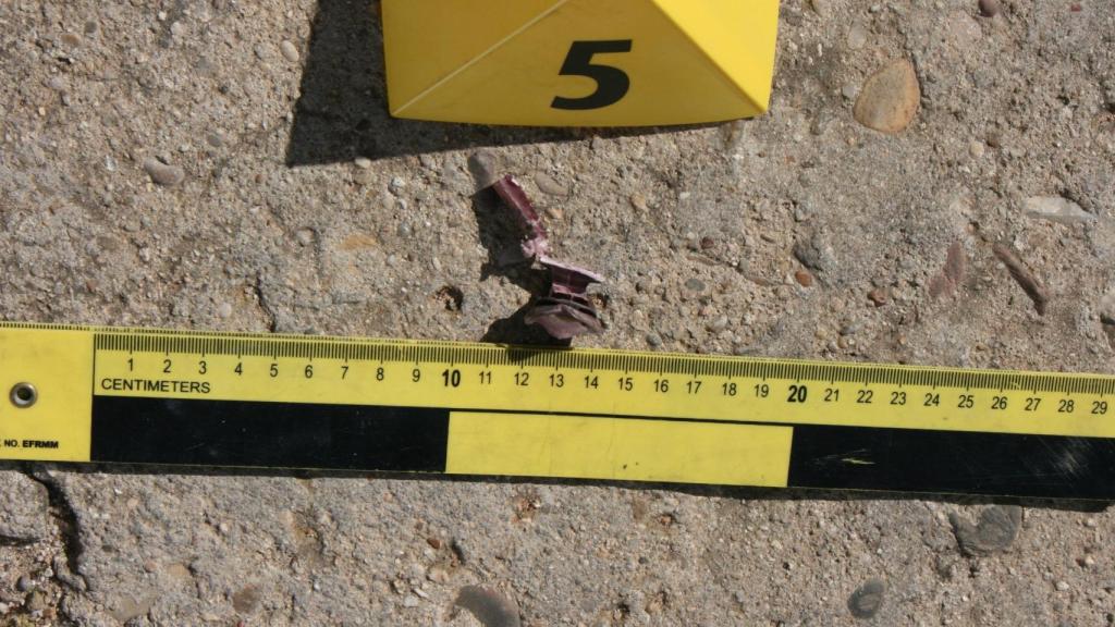 Uno de los cartuchos hallados por los investigadores.