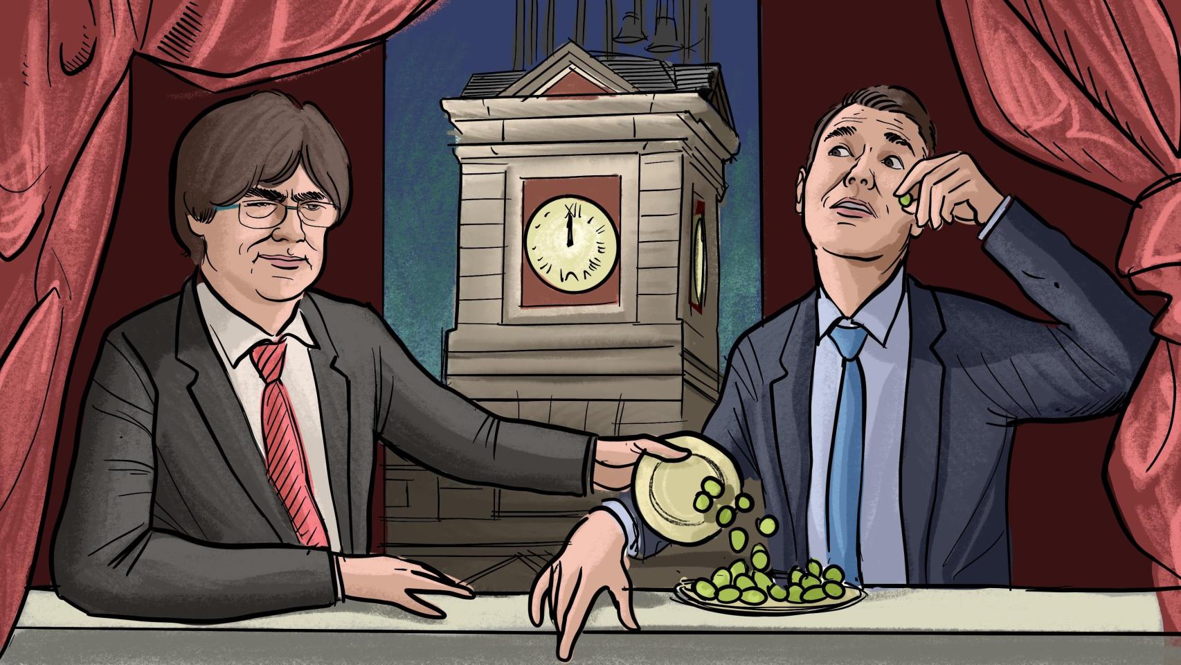 Frente al reloj de la Puerta del Sol, Carles Puigdemont vuelca su plato de uvas en el del presidente Pedro Sánchez.