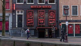The Red Barrio de Amsterdam is one of the largest prostitution spotlights in Europe.