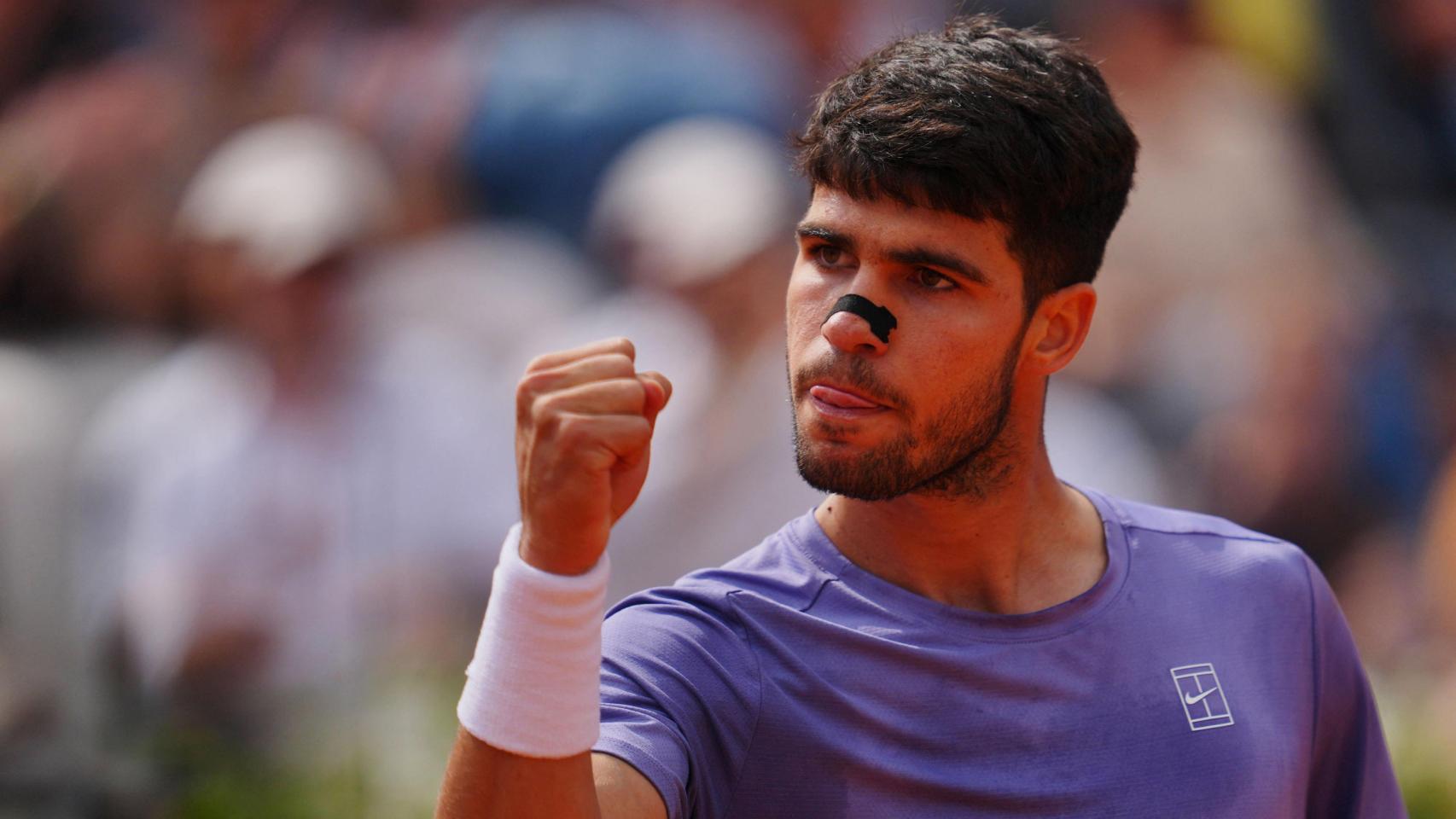Alcaraz celebra un punto ante Draper.