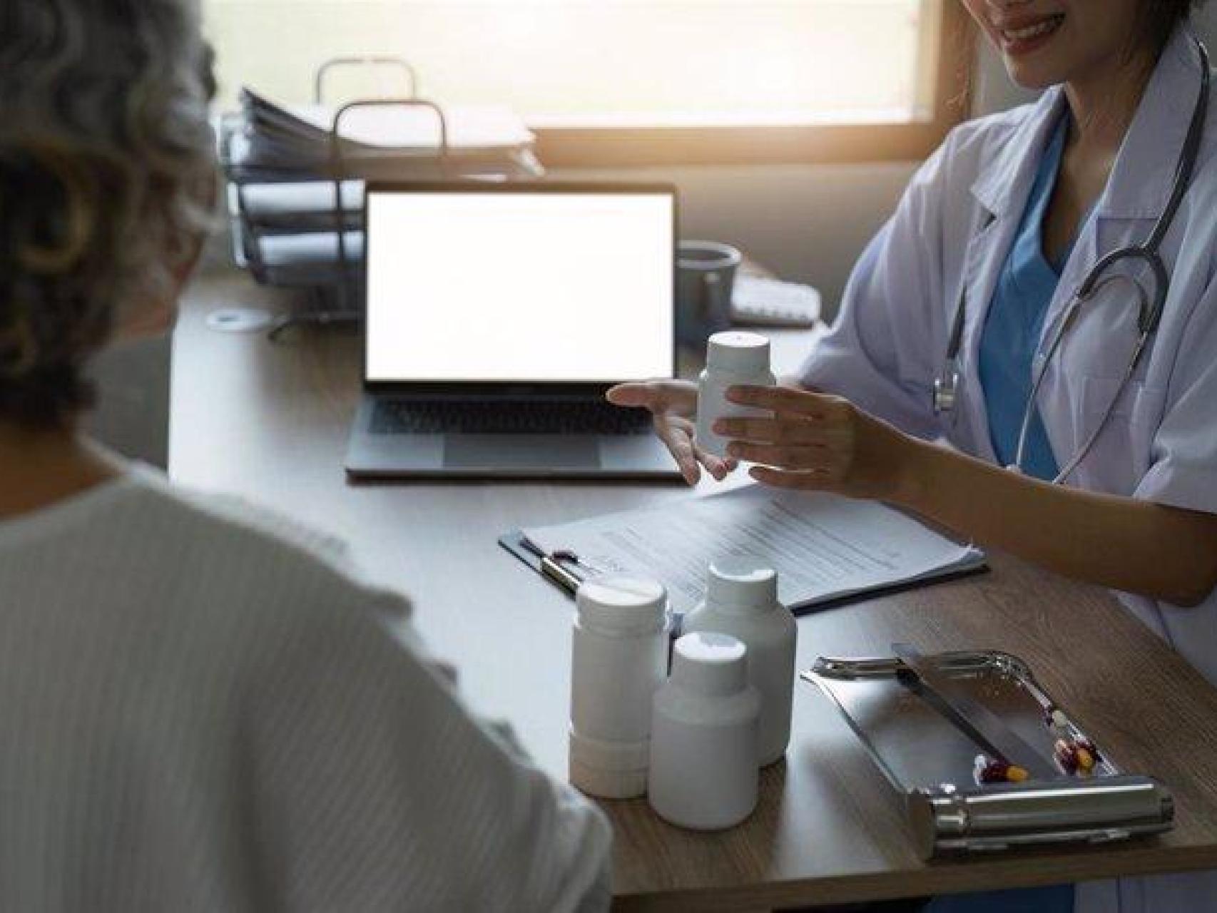 Primary Care Doctor in a consultation.