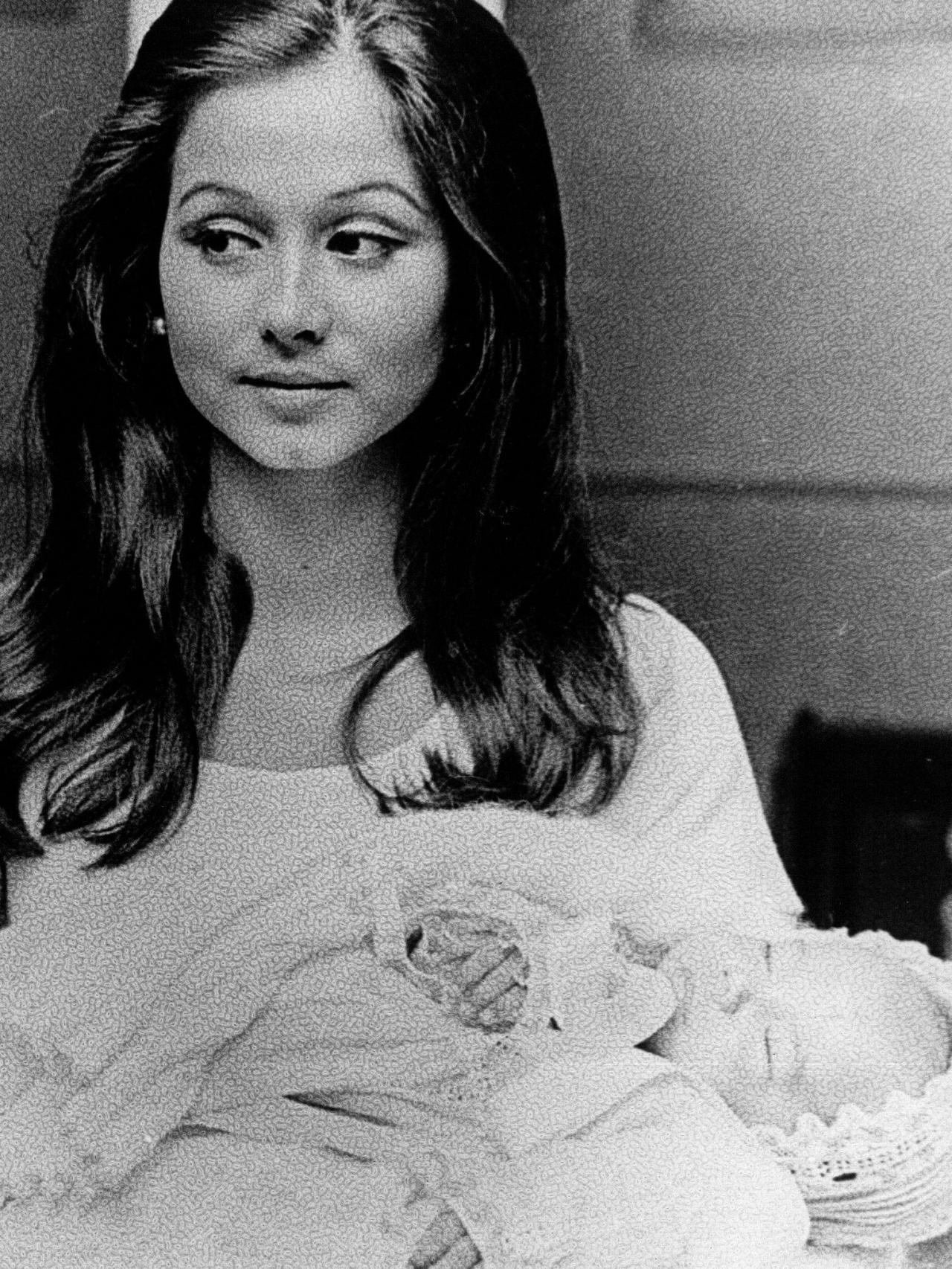 Isabel Preysler con su hijo Julio José en brazos.