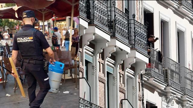 Un policía se lleva la bombona que amenazaba con explotar el hombre atrincherado en el centro de Madrid.