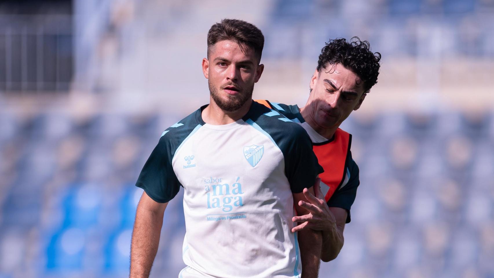 Dani Lorenzo y Dorrio durante un entrenamiento en La Rosaleda.