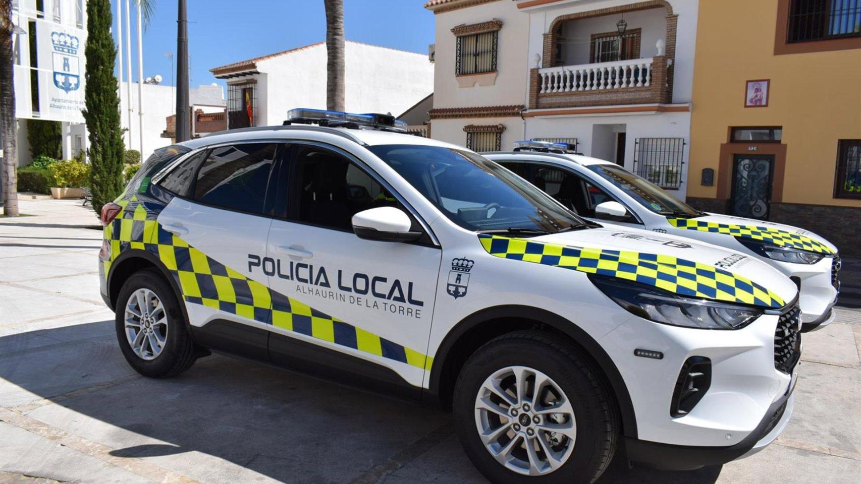 Dos coches de la Policía Local.