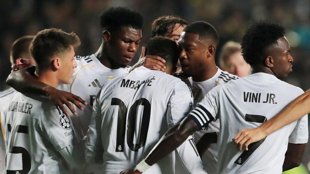 Real Madrid players celebrate Mbappé's goal against Kairat.