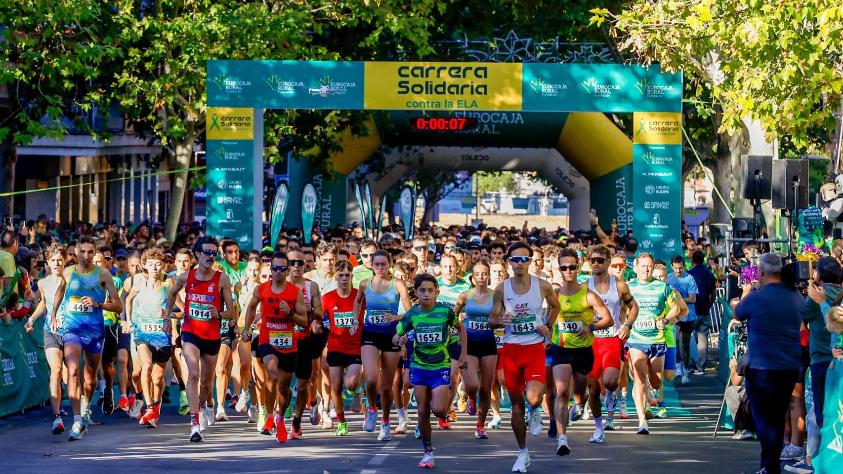 Toledo se vuelca contra la ELA en una carrera solidaria que ha congregado a casi 5.000 personas: todas las fotos