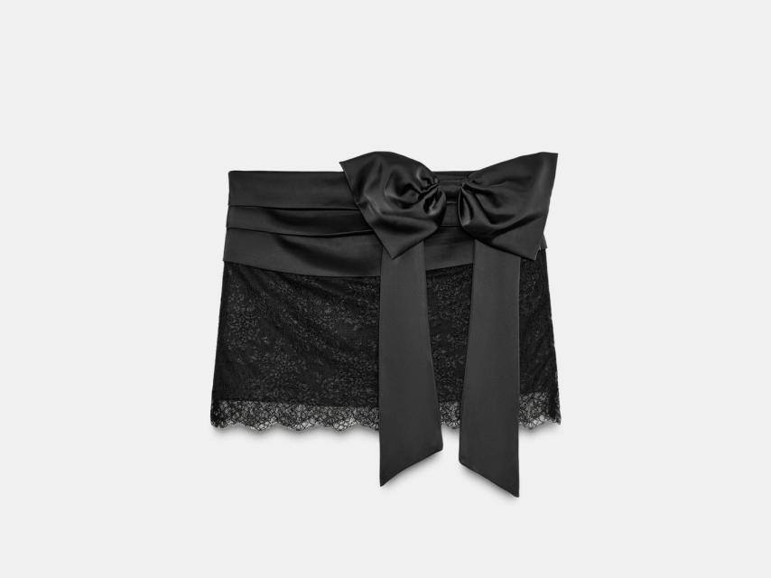 Falda mini combinada encaje lazo.