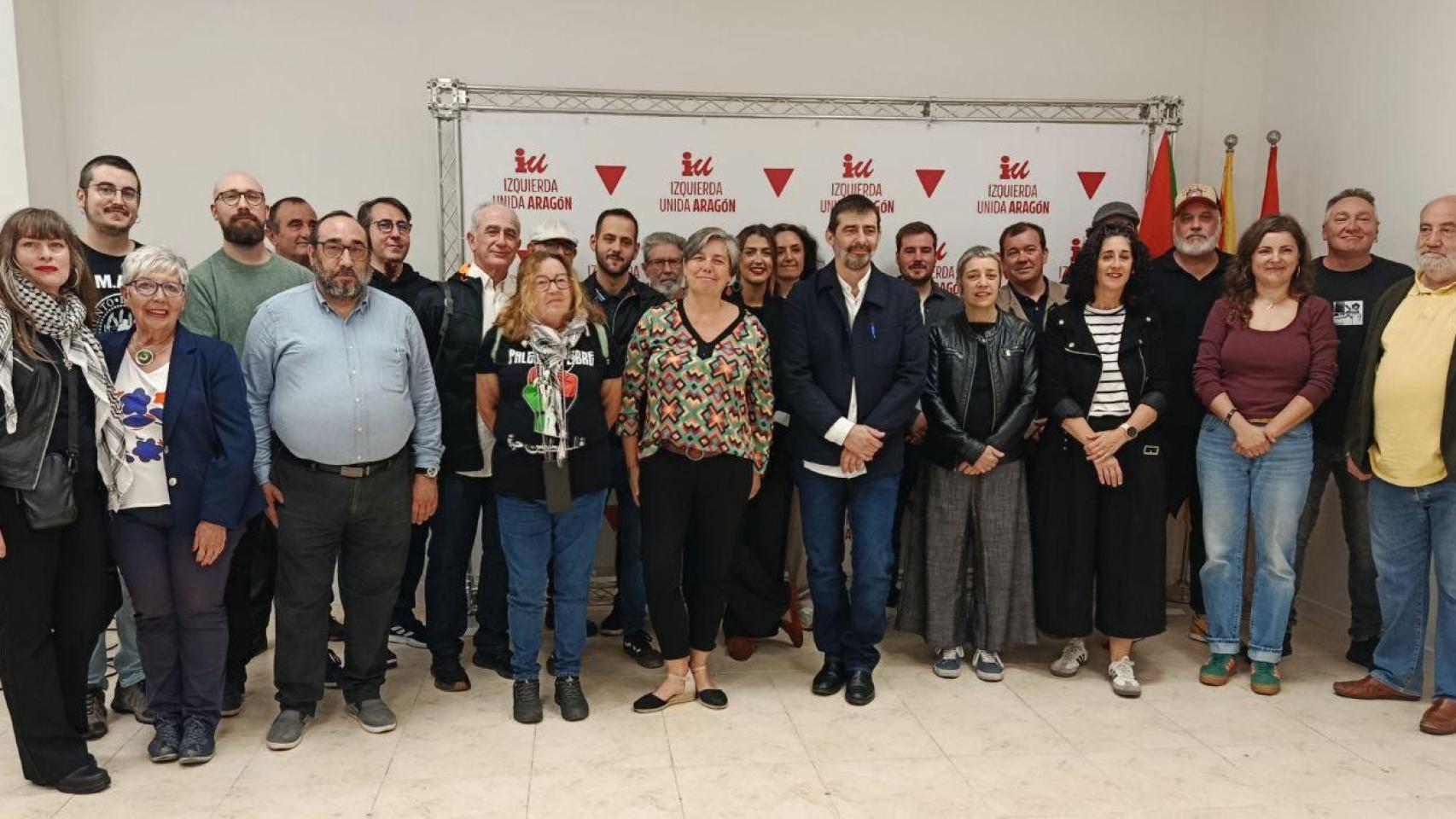 Álvaro Sanz, en el centro, junto a su coordinadora