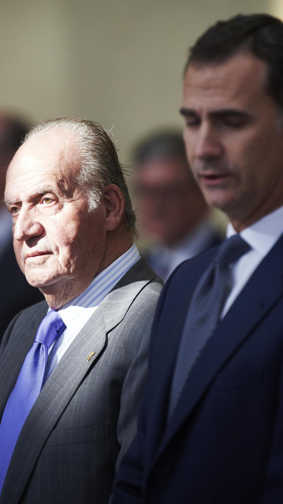 Juan Carlos I con su hijo Felipe.