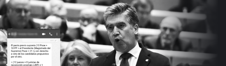 Ignacio Cosidó junto a una representación del 'whatsapp' que ha enviado a los senadores del PP