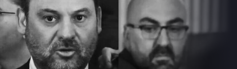 Koldo García Izaguirre, al fondo de la imagen, mientras su entonces jefe, José Luis Ábalos, atiende a la prensa